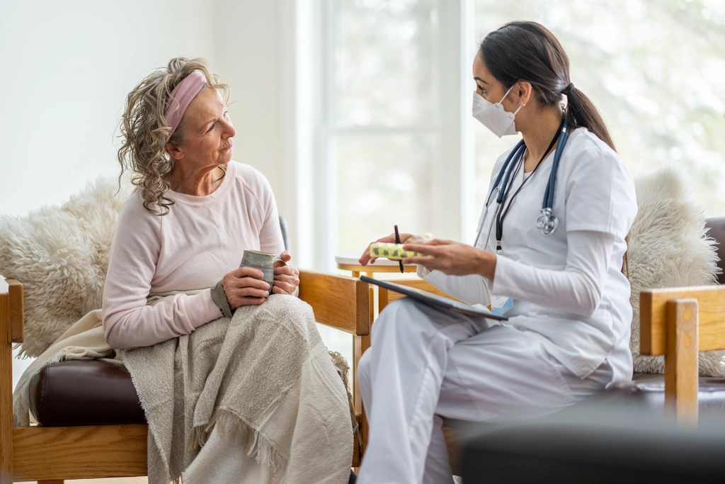 A provider administering palliative care